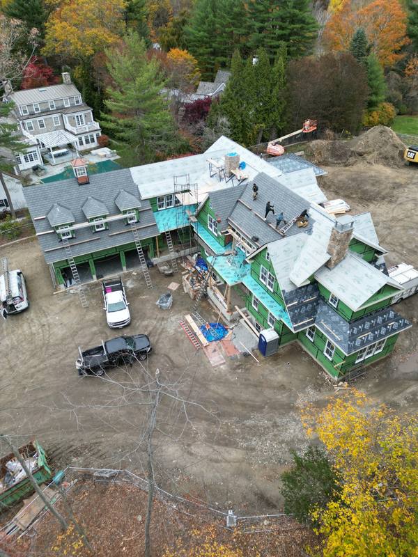 Large new-construction project with a slate-look roof going on